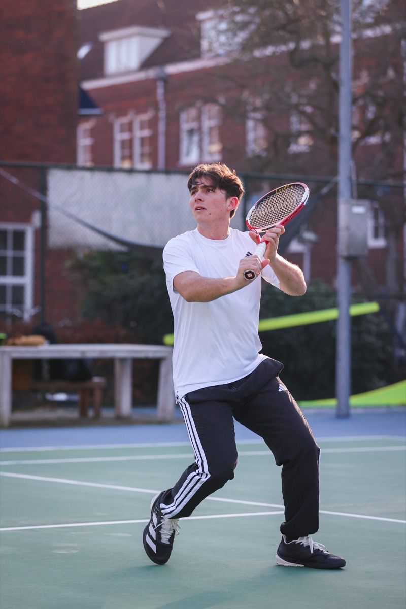 Noah Cladera, founder of Contakt, on a tennis court